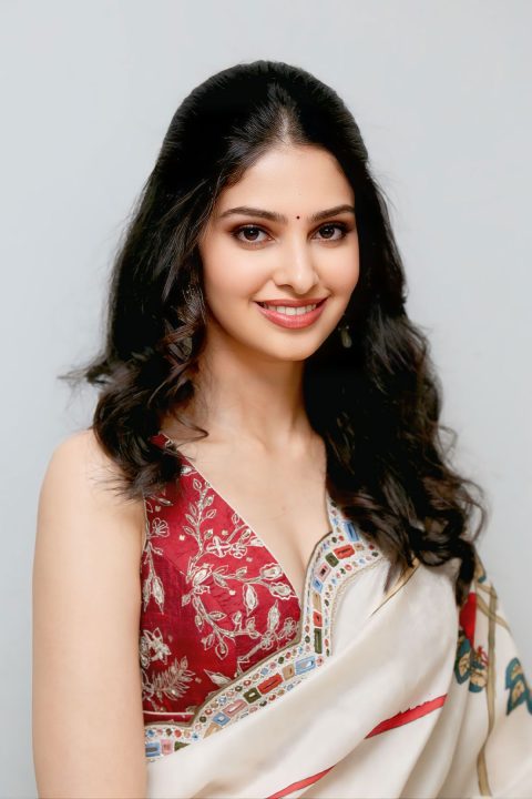 Manasa Varanasi Sizzles in Crimson Floral Saree at Couple Friendly Success Meet