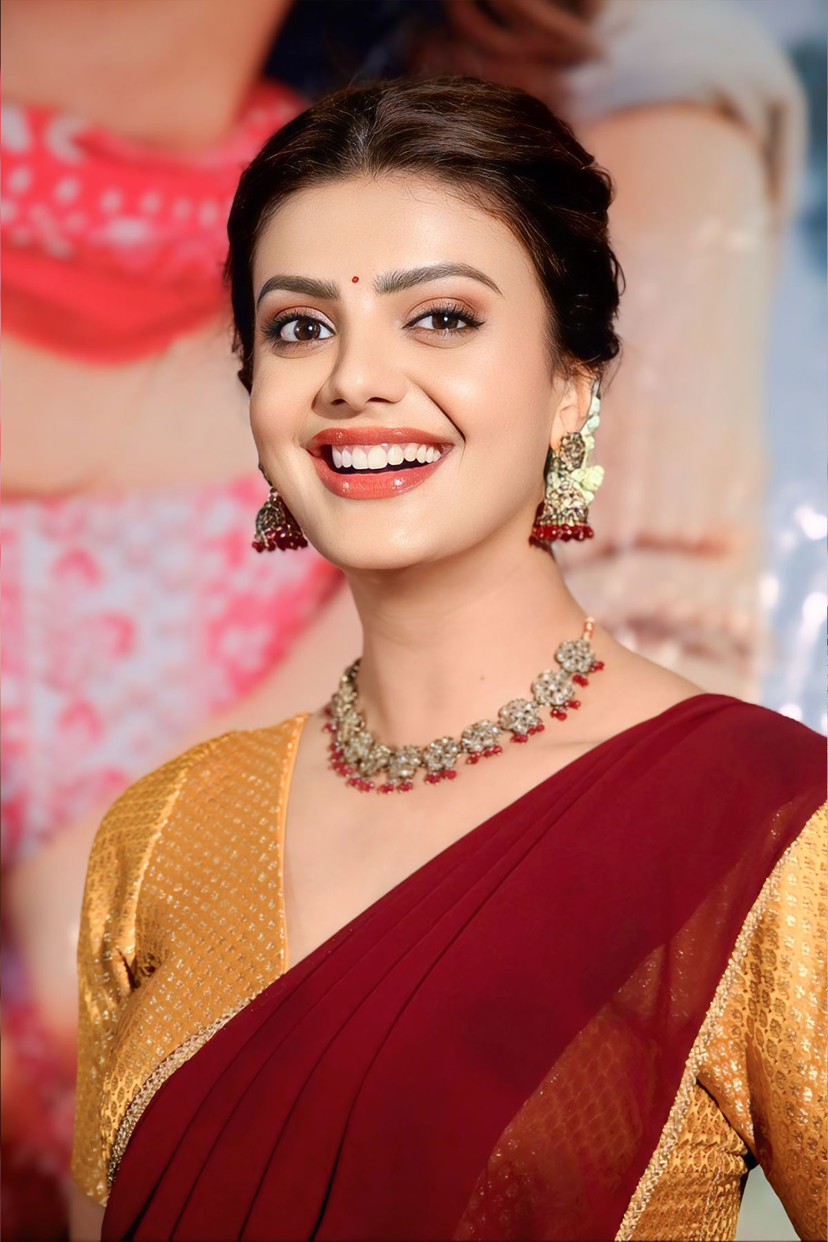 Son Of Pre-Release: Meera Raj Dazzles in Maroon & Gold Half-Saree