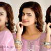Meera Raj Accessorizes Pink Kurta with Silver Bangles