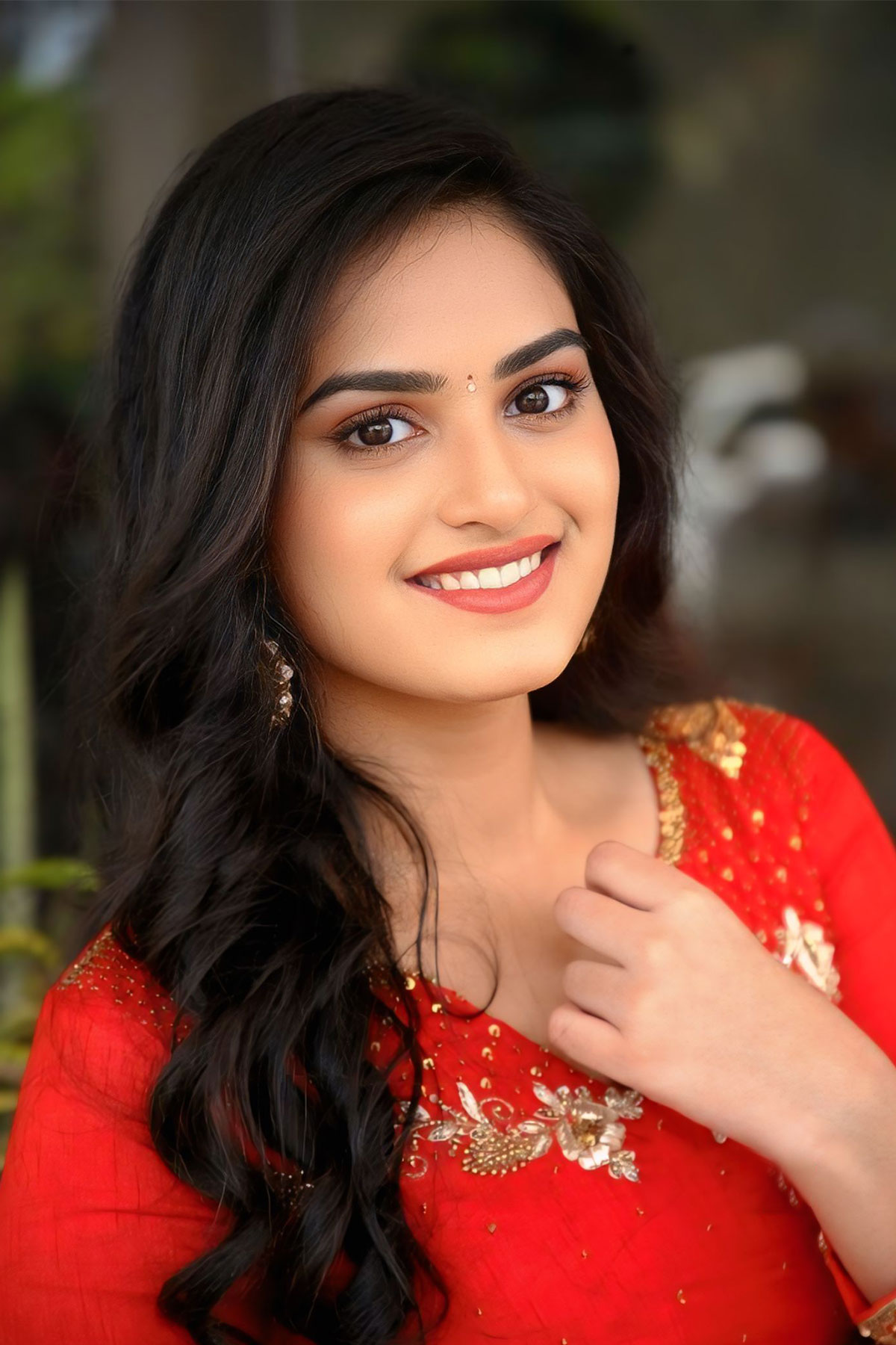 Rayancha Kokkura Stills in Orange Midi Dress | Purushaha Teaser Launch