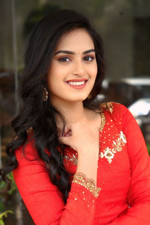 Rayancha Kokkura Radiates Charm in Orange Midi Dress Gallery