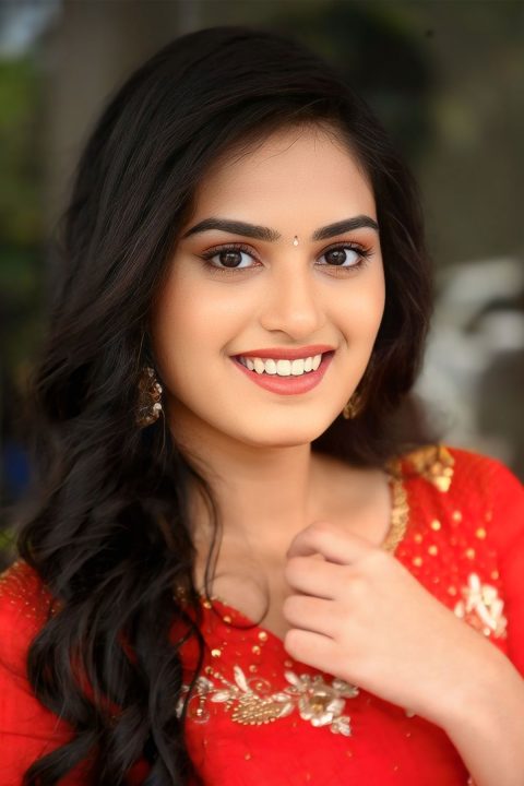 Rayancha Kokkura Dazzles in Elegant Orange Midi at Movie Launch
