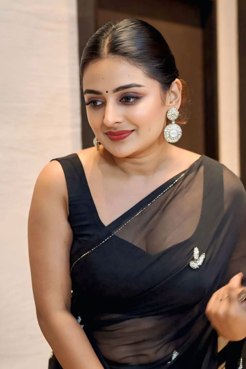 Esther Anil Dazzles in All-Black Saree at Drishyam 3 Event