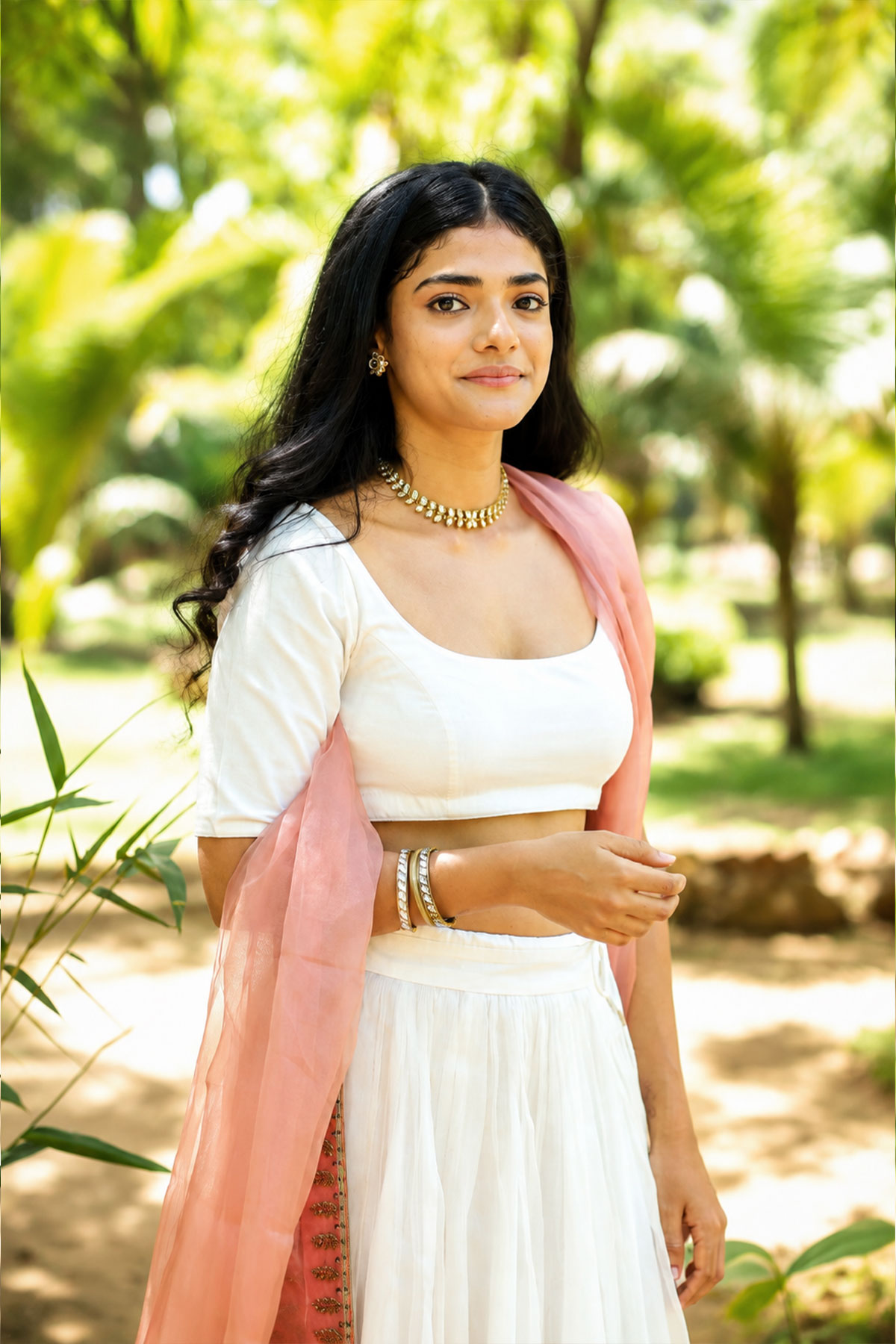 Ahilya Bamroo Dazzles in Pristine White Lehenga & Pink Dupatta