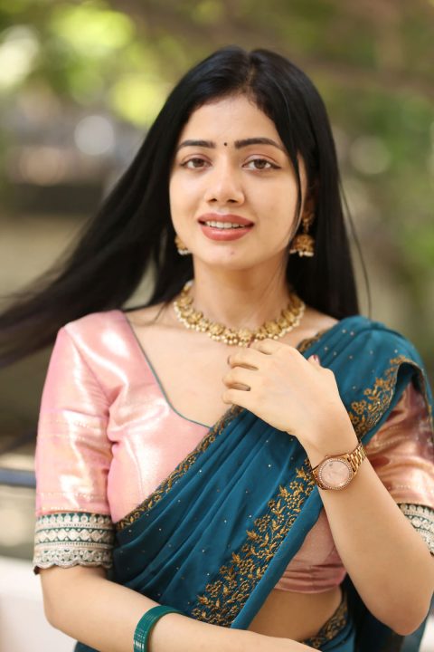 Bhairavi Ardhya Dazzles in Peach Satin Saree & Teal Dupatta