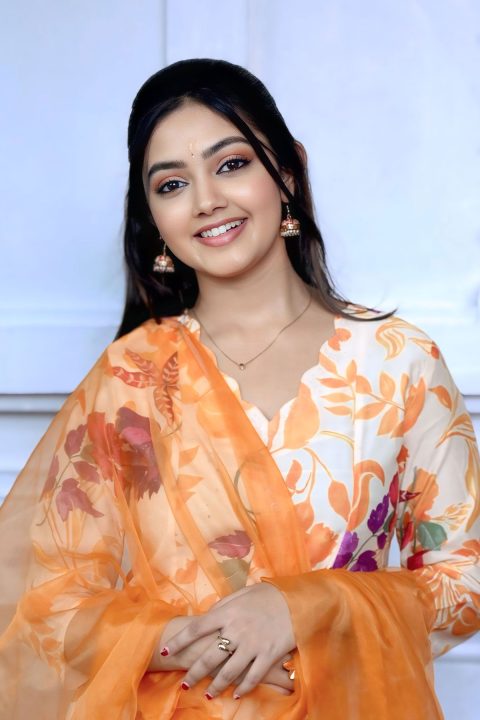 Divyani Mondal Dazzles in White-Orange Botanical Kurta Set