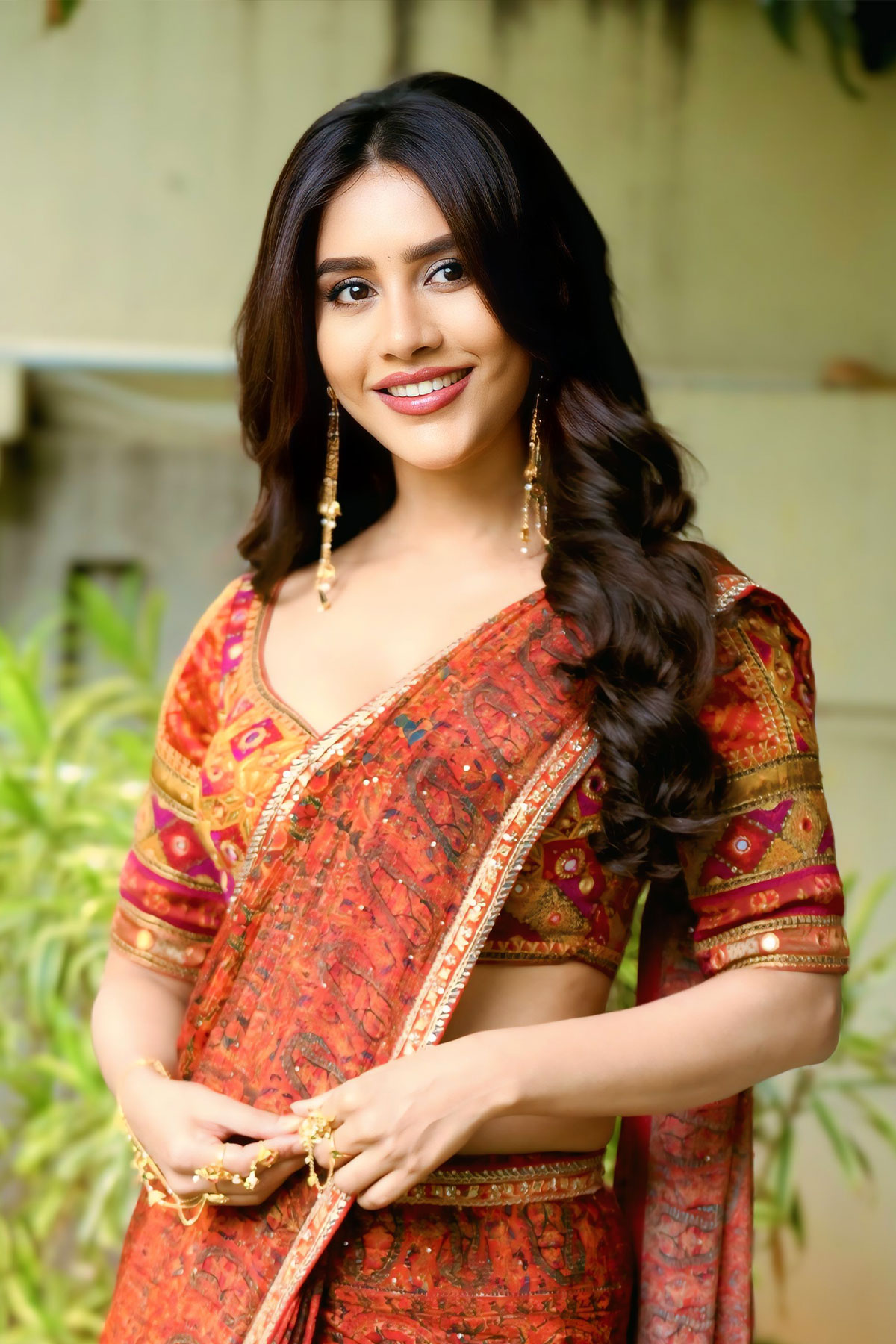 Nabha Natesh Glamorous Photos in Rust Ethnic Wear