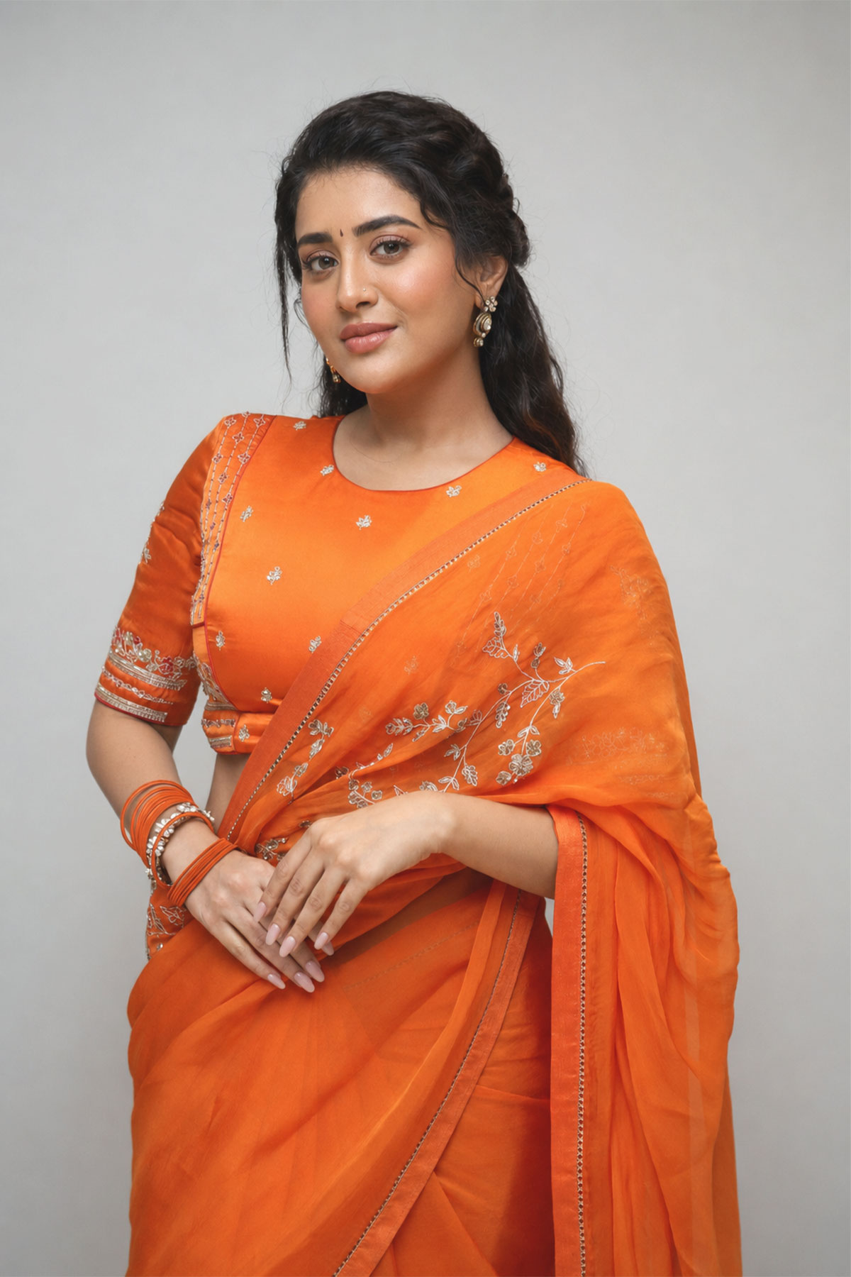 Beautiful Rashi Singh Images in Orange Traditional Embroidered Saree