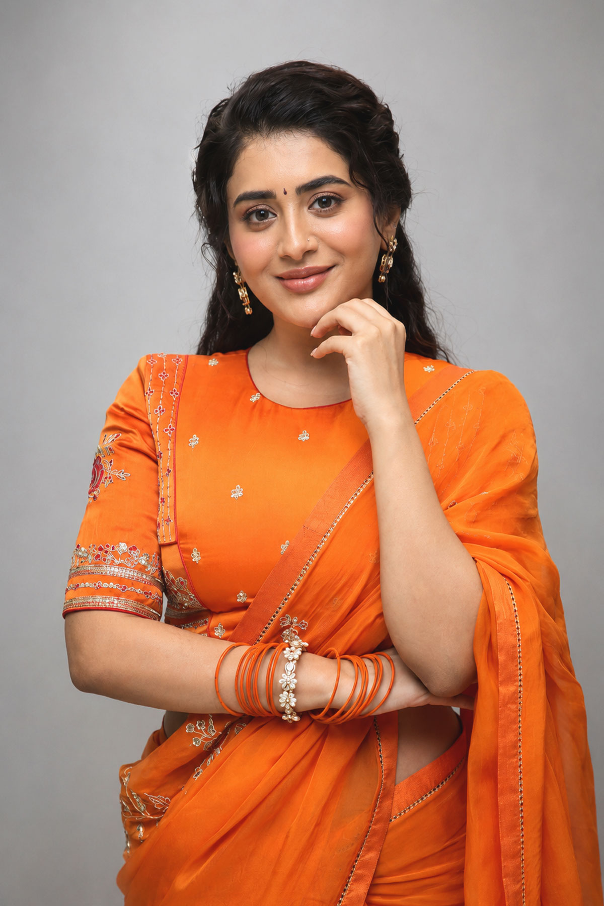 Rashi Singh Sets Ethnic Fashion Goals in Orange Embroired Saree