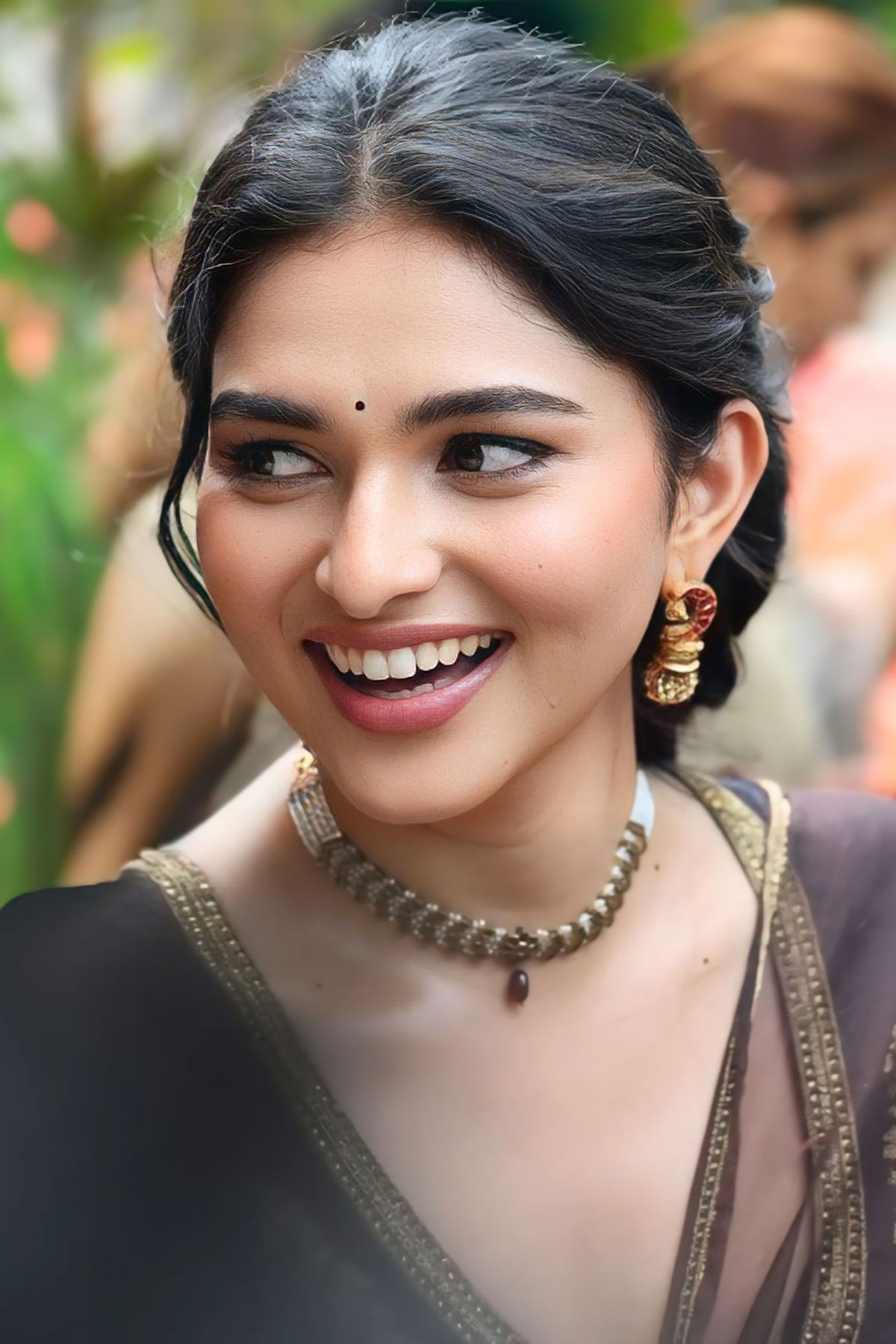 Kayadu Lohar in Dark Chocolate Saree at Idhayam Murali Meet