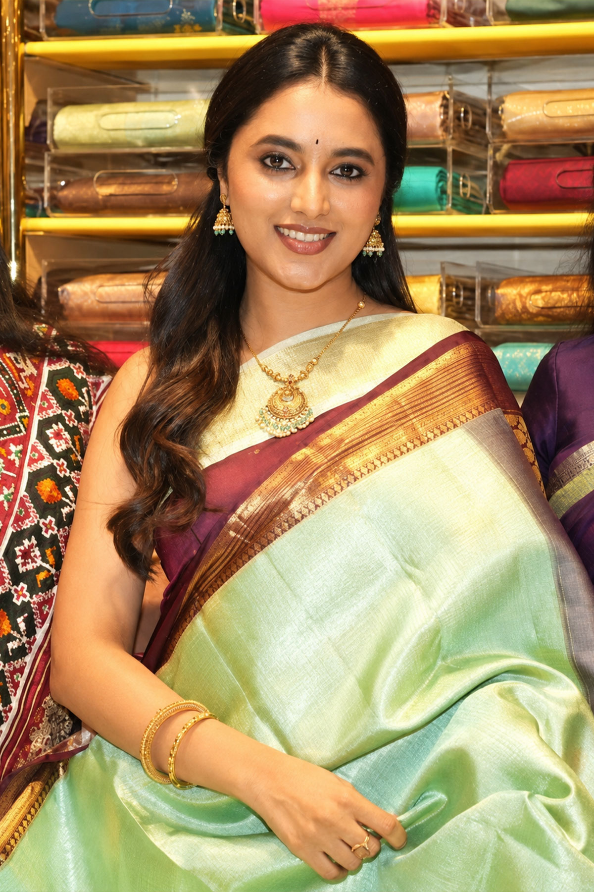Priyanka Mohan Wine Purple Silk Saree and Temple Jewellery