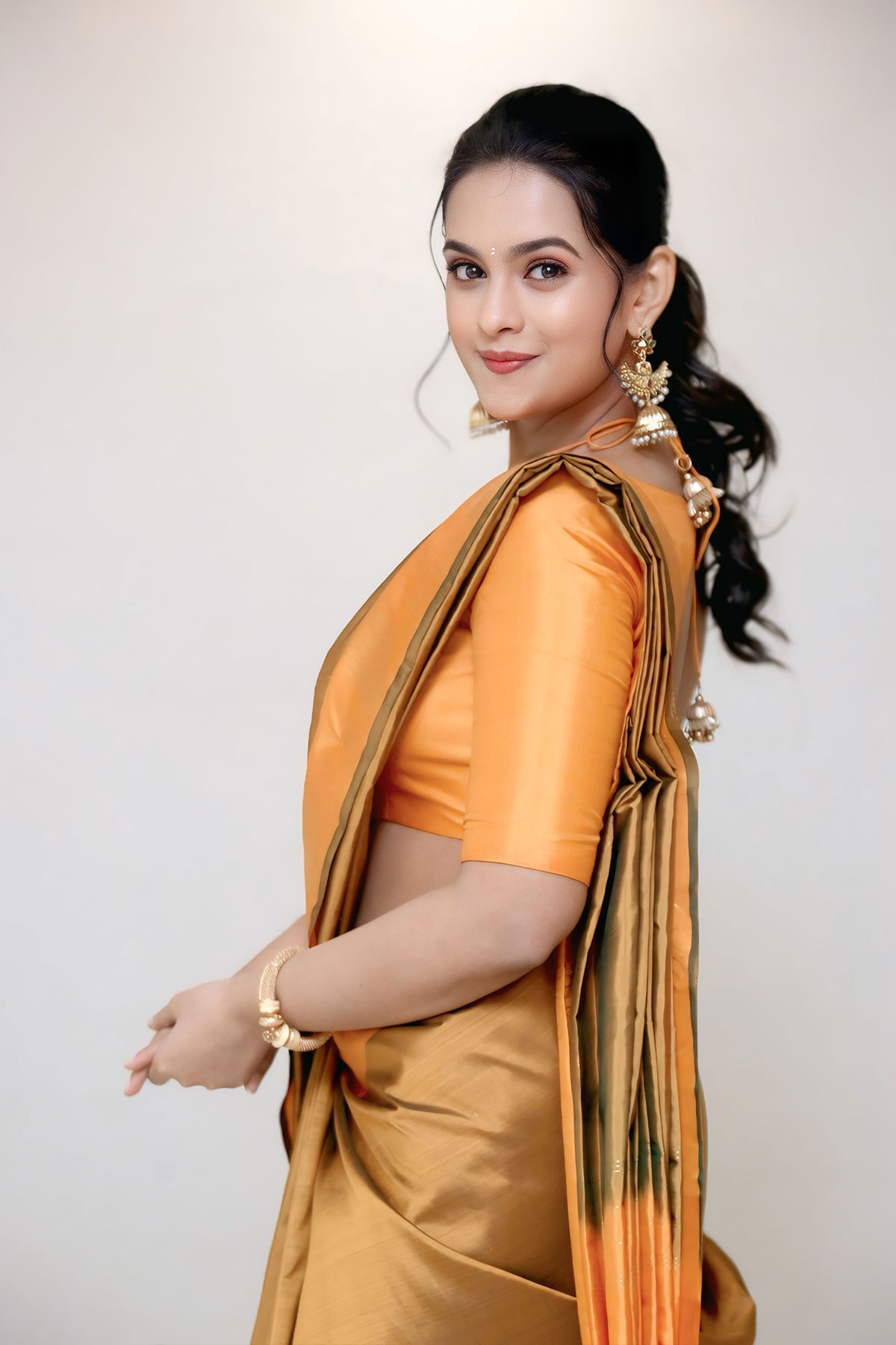 Samaira Sri Antique Peacock Jhumkas and Silk Saree
