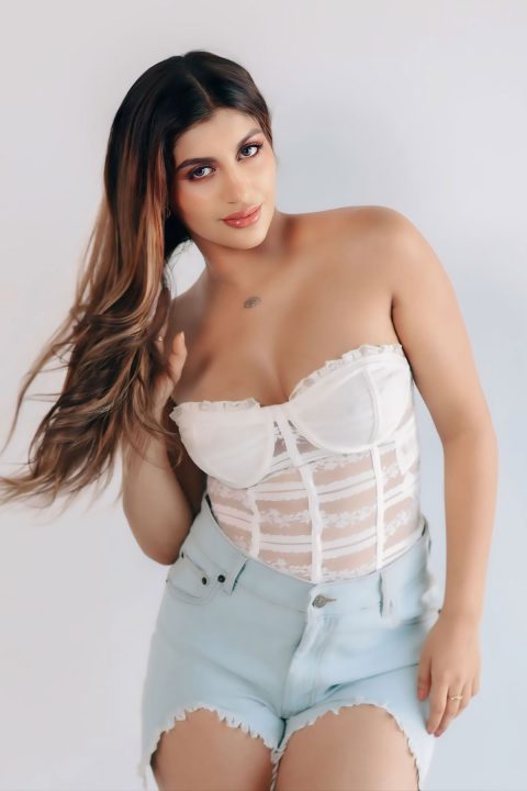 Yashika Aannand Sexy White Corset Photoshoot with Bold Style