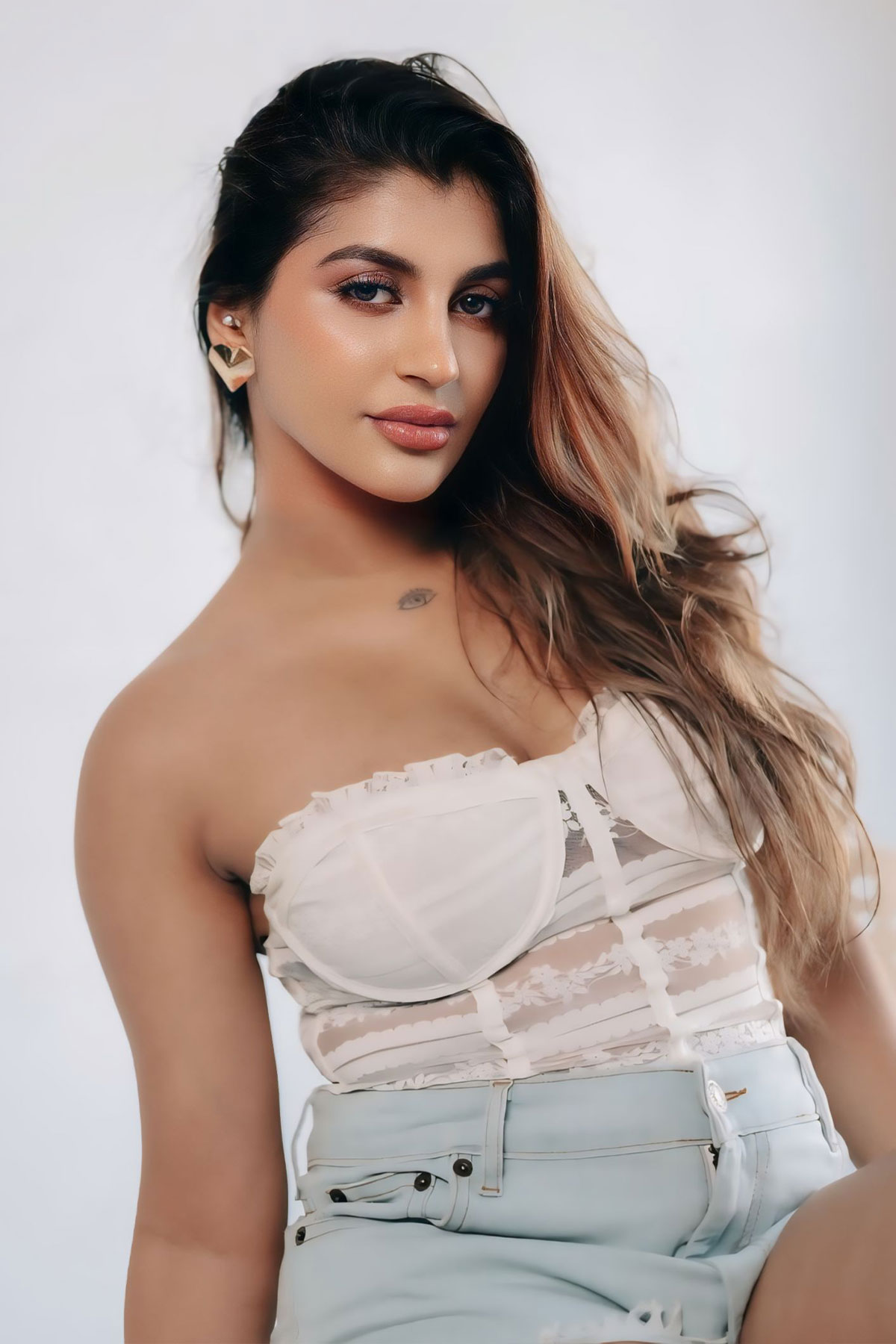 Yashika Aannand Stunning Hot Look in White Corset and Shorts