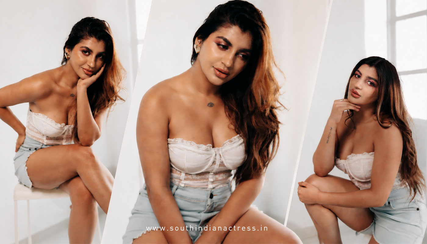 Yashika Aannand Bold Fashion Photos in White Lace Corset Outfit