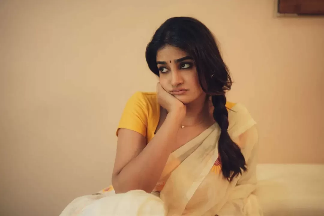 Dimple Hayathi Floral Saree Captures a Warm Cinematic Mood