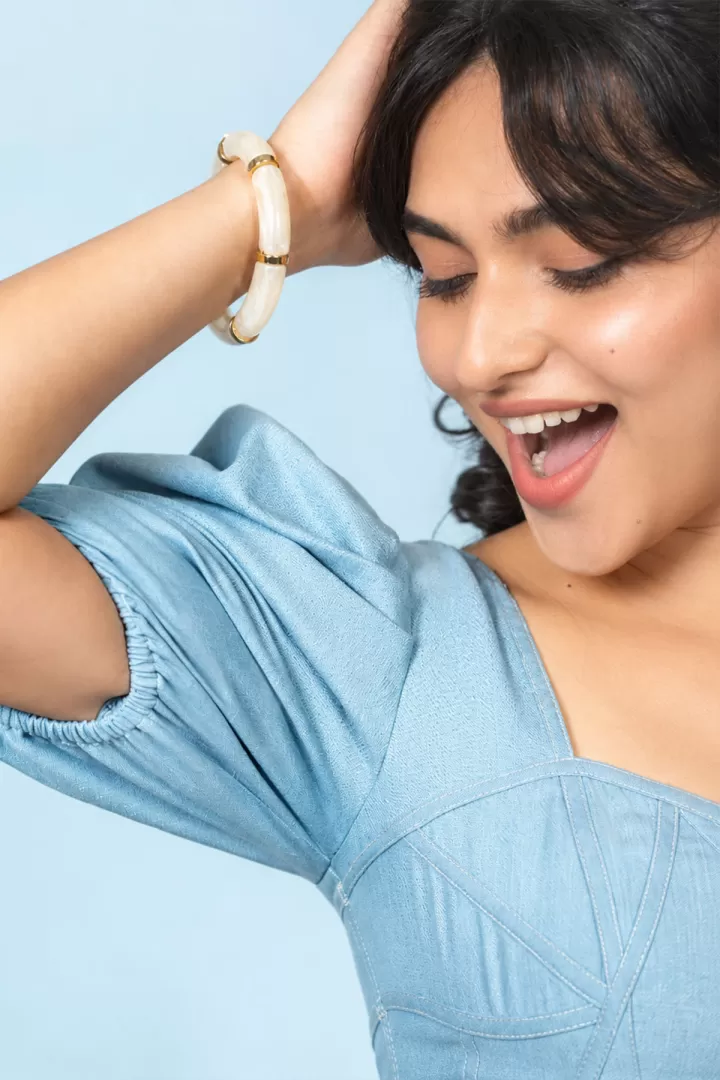 Kayadu Lohar Playful Glamour Pose in Blue Puff Sleeve Outfit